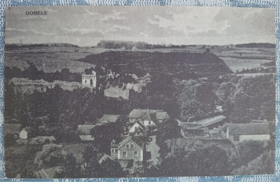 View of the Dobele Castle ruins, bridge, and Grand Street 1997(*) Dobele 13x8 cm postcard Latvia  