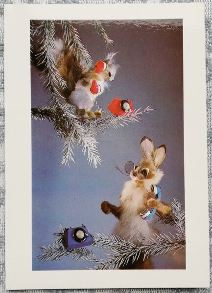 "Best wishes for a Happy New Year!" 1986 New Year's card of the USSR Hare with a Squirrel speaks on the phone 10.5x15 cm 